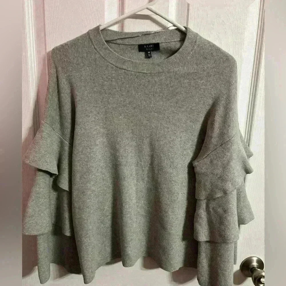 KAARI blue sweater